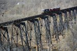 NS 7676 with train 90G halfway across the James River trestle